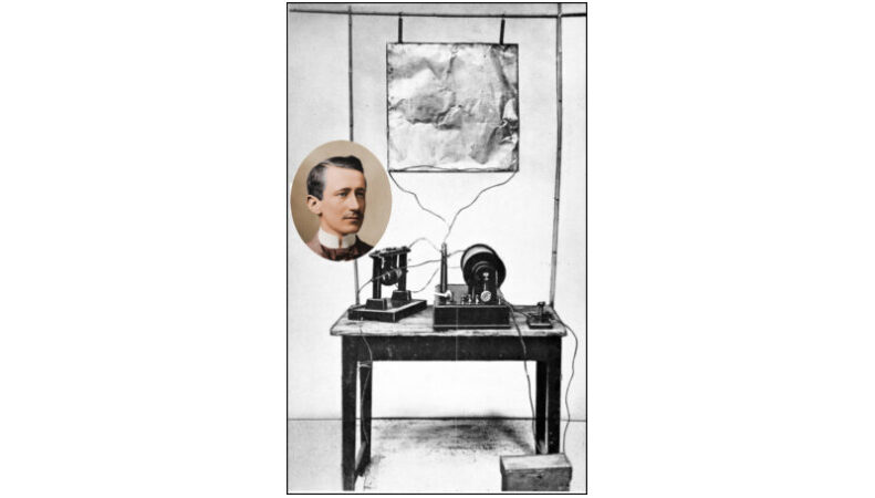 Photo of Marconi inset, and his first transmitter incorporating a monopole antenna. It consisted of an elevated copper sheet (top) connected to a Righi spark gap (left) powered by an induction coil (center) with a telegraph key (right) to switch it on and off to spell out text messages in Morse code. Image credit: Guglielmo Marconi, Looking back over thirty years of radio, Radio Broadcast magazine, Doubleday, Page, and Co., New York, Vol. 10, No. 1, November 1926, p. 31. Public domain.