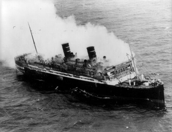 The SS Morro Castle burns at sea. Image Credit: International News Photos, Inc. - This image is available from the United States Library of Congress Prints and Photographs division under the digital ID cph.3b14818.