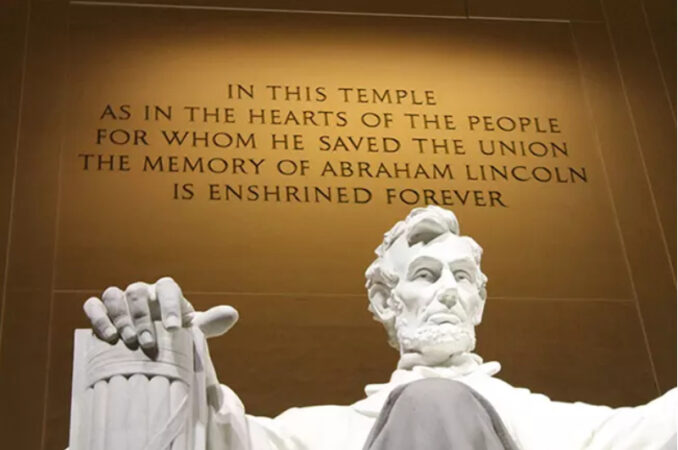 Photo showing the lettering behind the iconic statue of Abraham Lincoln at the Lincoln Memorial in Washington, D.C., is an example of the work of expert stone cutter and sculptor Ralph Ardolino. National Park Service photo, public domain.