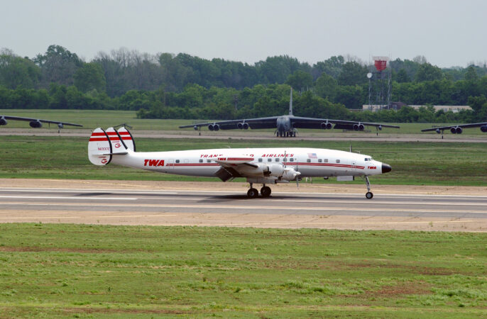 Image of a restored L-1049H Super Constellation of the National Airline History Museum in full Trans World Airlines colors in 2004. Photo by MSGT Michael A. Kaplan, USAF - This image was released by the United States Air Force with the ID 040423-F-0558K-033. This image shows a A Lockheed L1049H Constellation (N6937C, c/n 1049H-4830) historic airliner aircraft taxies on the runway at Barksdale Air Force Base, Louisiana. Public Domain.