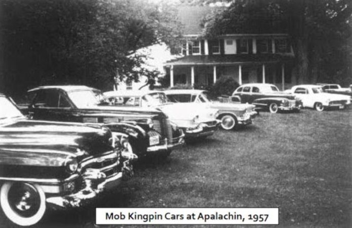 Cars belonging to organized crime leaders parked at Joseph Barbara's home in Apalachin, N.Y. FBI file photo, public domain.
