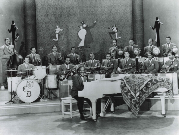 Count Basie Orchestra film still from Air Mail Special soundie, 1941, Institute of Jazz Studies photograph collection (IJS.0048), Institute of Jazz Studies, Rutgers University Libraries. Original image held by Herrick Library, Los Angeles.