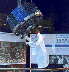 Photograph of the TIROS-1 satellite taken at the Smithsonian National Air and Space Museum. Public Domain.