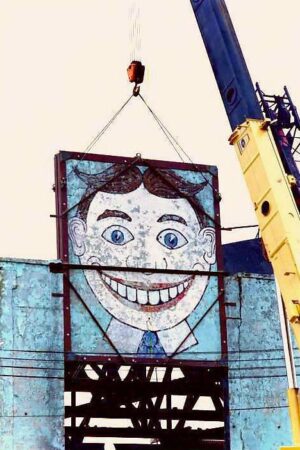 Photo of "Tillie" mural being removed from condemned Palace Amusements building. Photo credit: ©2004, Frank Saragnese, used with permission.