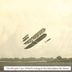Photo of the Wright Brothers' airplane in flight at the 1910 air show in Interlaken.